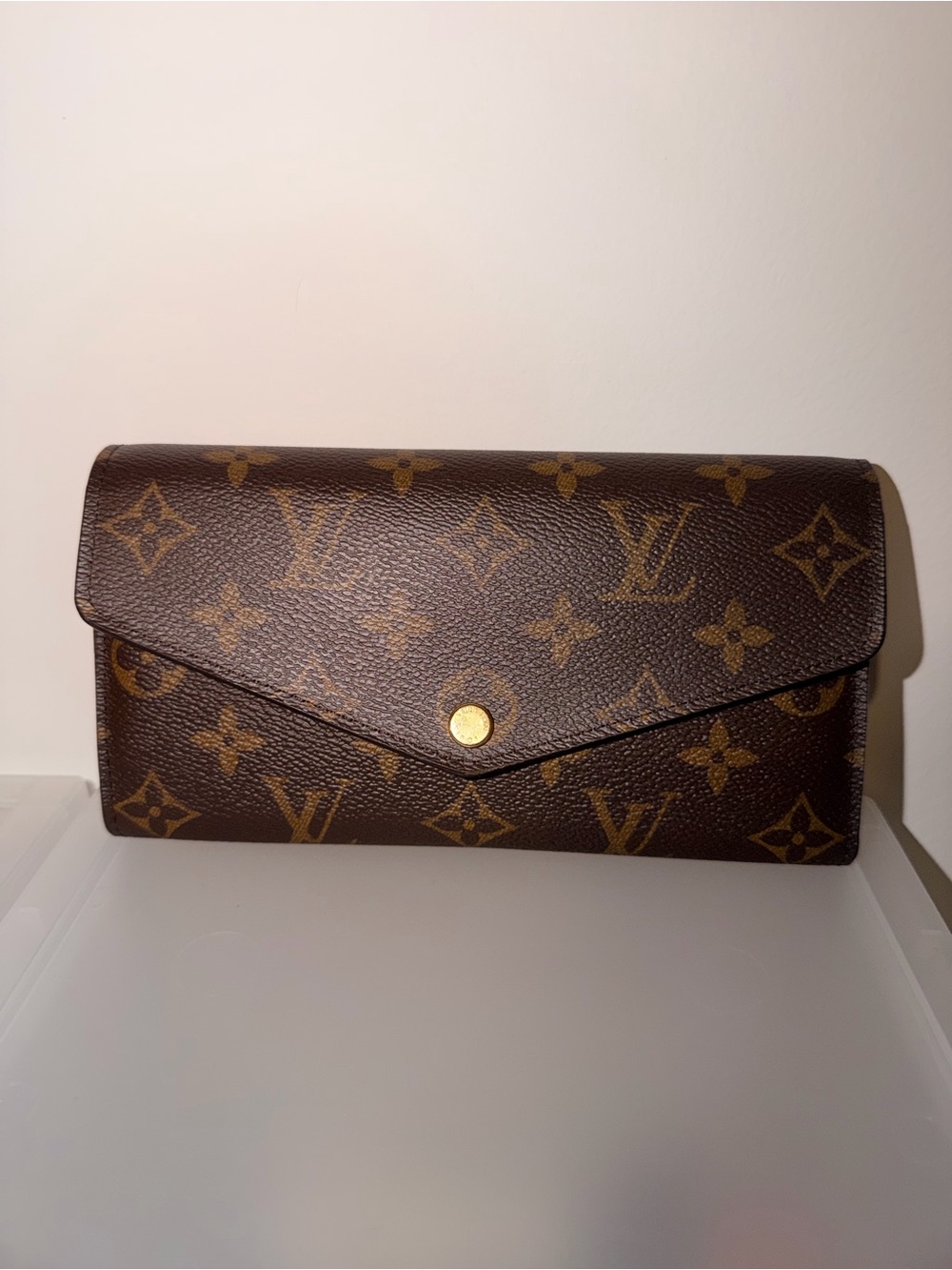 Authentic Louis Vuitton Monogram Sarah Wallet in color poppy